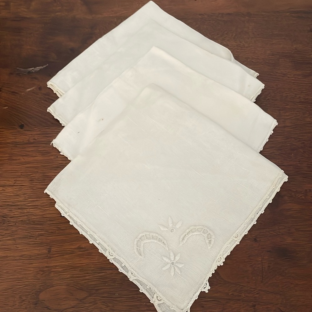 Set of four antique napkins